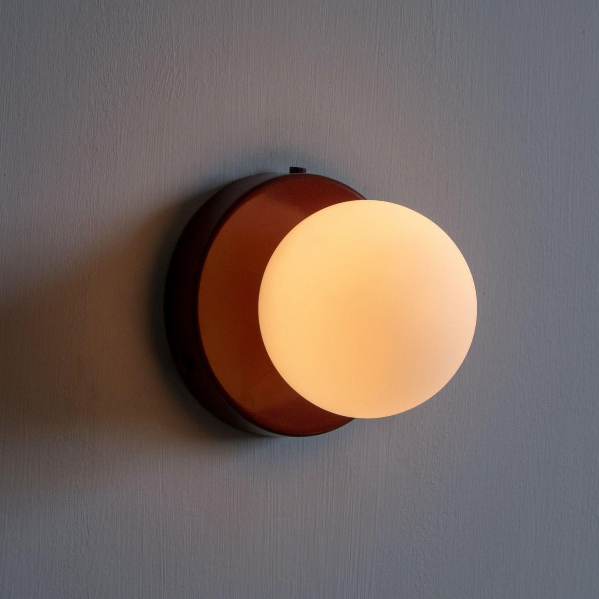 Halo Globe Sconce White Glass Wall Light with Circular Metal Backplate